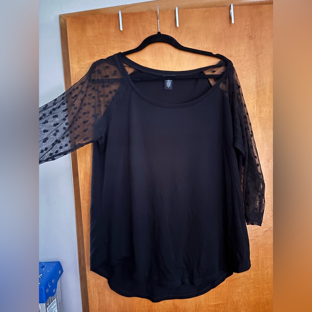 Torrid black blouse with see through polka dot sleeves size 1X